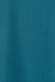 Product shot of The Keepers Tee in colour Opal (Blue), detail