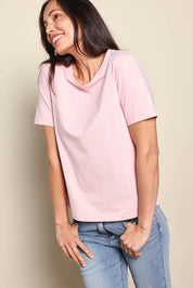 Model Amandam wearing size 10 of the The Keepers Tee – Softpink in colour Softpink, from an angle