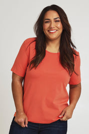 Model Ashleighf wearing size 16 of the The Keepers Cotton Tee – Sunset in colour Sunset, in a cropped view