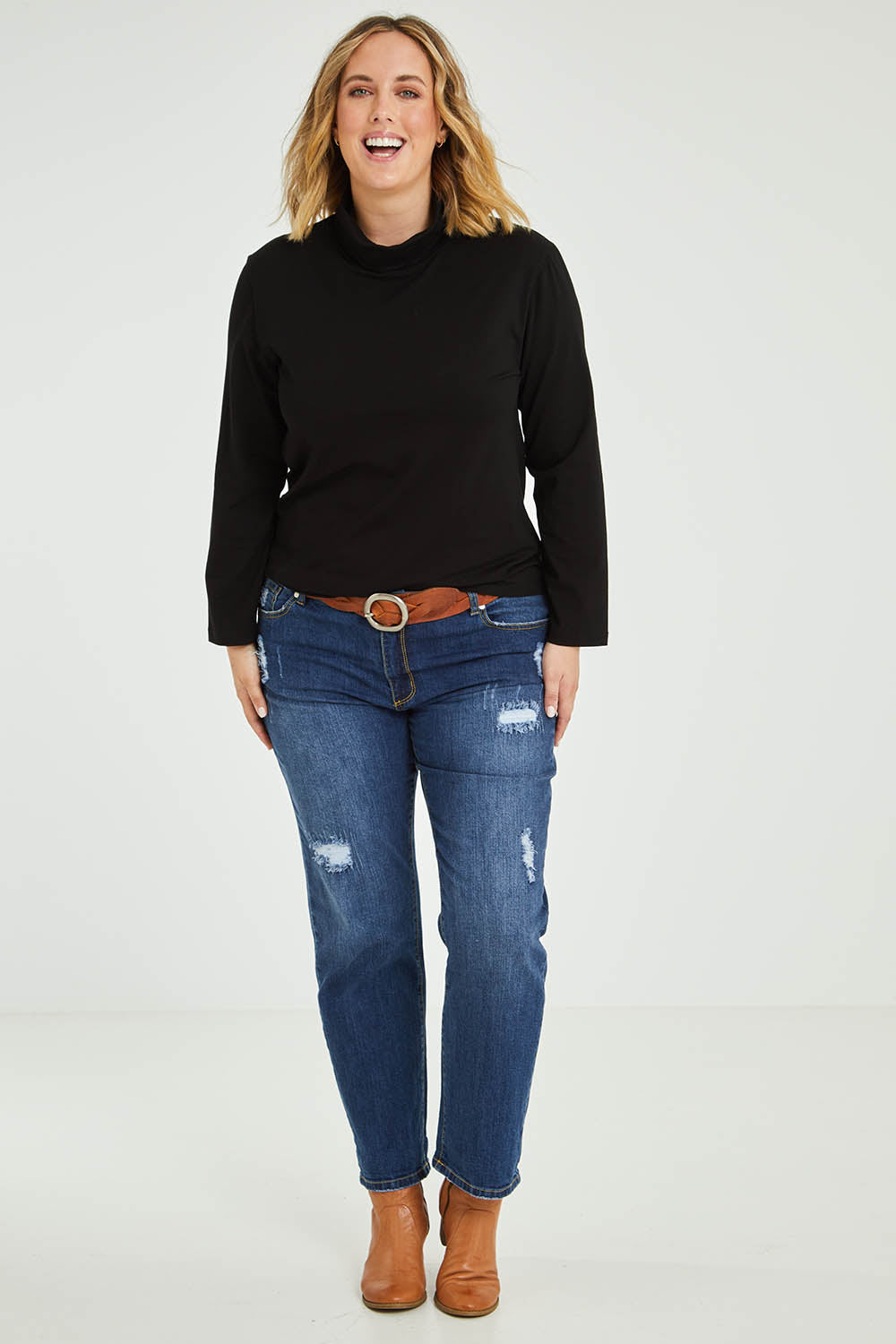 Model Jess wearing size 14 of The Keepers Skivvy in colour Black (Black), from the front, showing the whole outfit