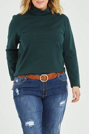 Model Jess wearing size 14 of The Keepers Skivvy in colour Pinegreen (Green), from the front, cropped image