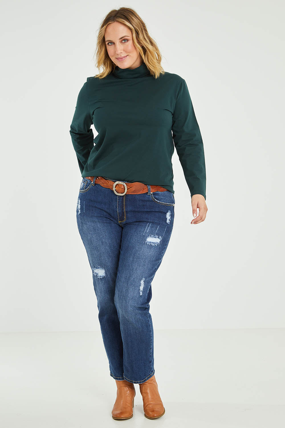 Model Jess wearing size 14 of The Keepers Skivvy in colour Pinegreen (Green), from the front, showing the whole outfit