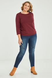 Model Fiona wearing size 16 of The Keepers 3/4 Sleeve Tee in colour Burgundy (Purple), from the front, showing the whole outfit
