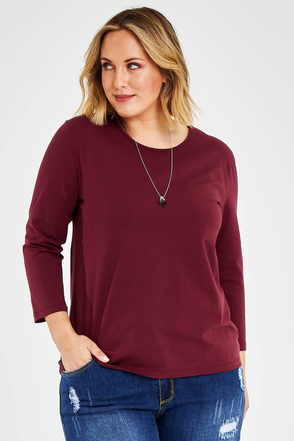 Model Jess wearing size 14 of The Keepers 3/4 Sleeve Tee in colour Burgundy (Purple), from the front, cropped image