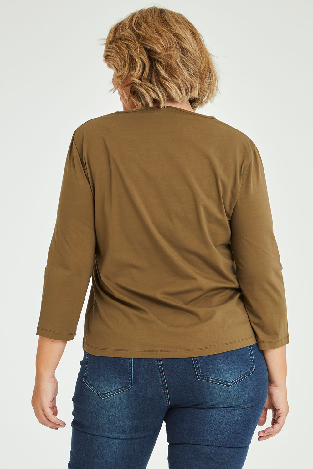 Model Fiona wearing size 16 of The Keepers 3/4 Sleeve Tee in colour Olive (Green), from the back