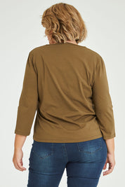 Model Fiona wearing size 16 of The Keepers 3/4 Sleeve Tee in colour Olive (Green), from the back