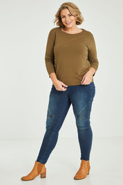 Model Fiona wearing size 16 of The Keepers 3/4 Sleeve Tee in colour Olive (Green), from the front, showing the whole outfit