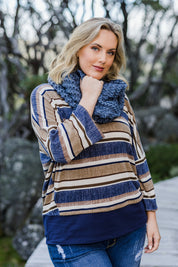 Model Jess wearing size 14 of The Striped Knit Top in colour Multistrip (Blue), from the front, showing the whole outfit