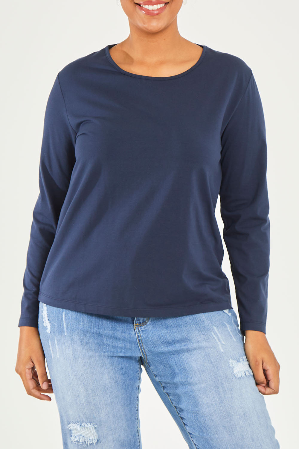 Model Noli wearing size 14 of The Keepers Long Sleeve Tee in colour Darknavy (Blue), from the front, cropped image