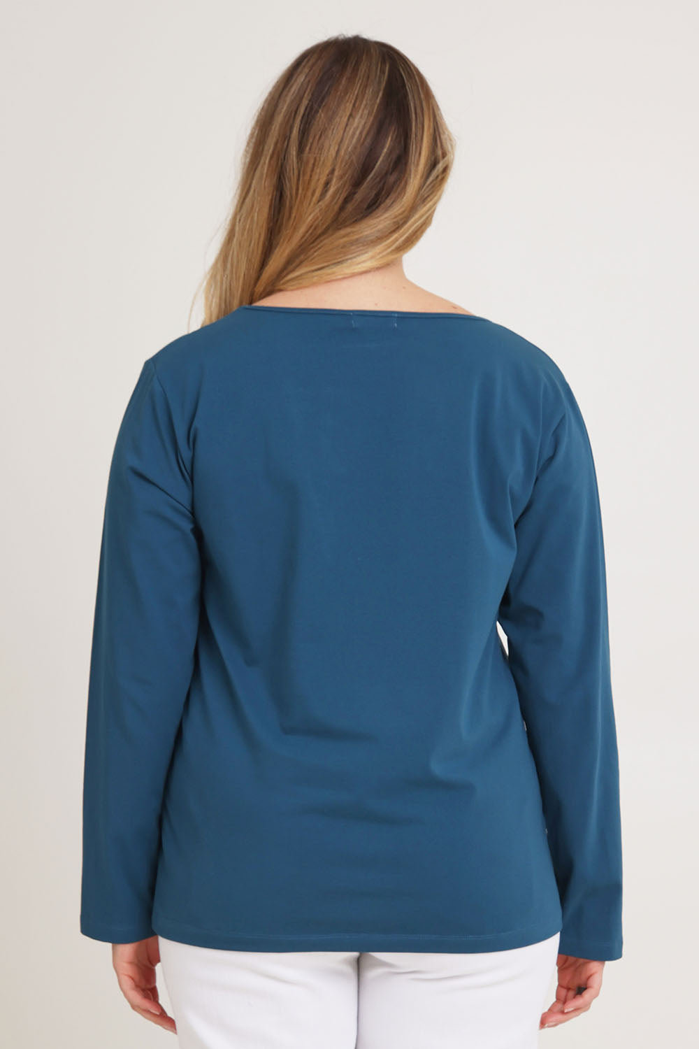 Model Chanel wearing size 16 of The Keepers Long Sleeve Tee in colour Opal (Blue), from the back