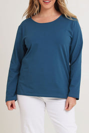 Model Chanel wearing size 16 of The Keepers Long Sleeve Tee in colour Opal (Blue), from the front, cropped image