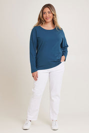 Model Chanel wearing size 16 of The Keepers Long Sleeve Tee in colour Opal (Blue), from the front, showing the whole outfit