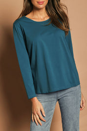 Model Madeline wearing size 10 of The Keepers Long Sleeve Tee in colour Opal (Blue), from the front, cropped image