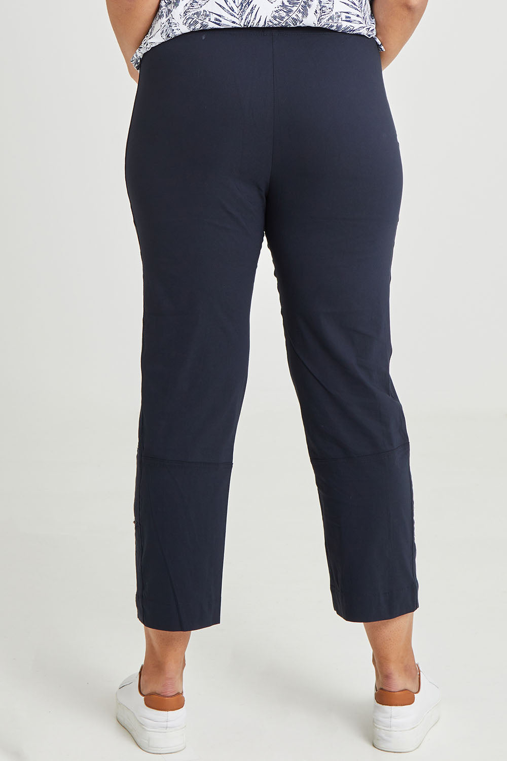 Model Terri-Leigh wearing size 14 of The Casual Pull On Summer Pant in colour Navy (Blue), from the back
