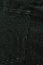 Product shot of The 5 Pocket Cord Midi Skirt in colour Deepforest (Green), detail