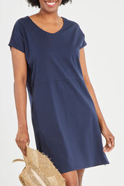 Model Aiyana wearing size 10 of The Luxe Cotton Tee Dress in colour Navy (Blue), from the front, cropped image