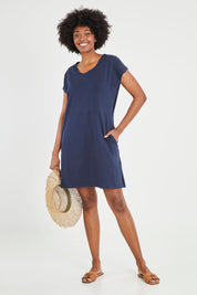 Model Aiyana wearing size 10 of The Luxe Cotton Tee Dress in colour Navy (Blue), from the front, showing the whole outfit