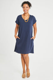 Model Noli wearing size 14 of The Luxe Cotton Tee Dress in colour Navy (Blue), from the front, showing the whole outfit