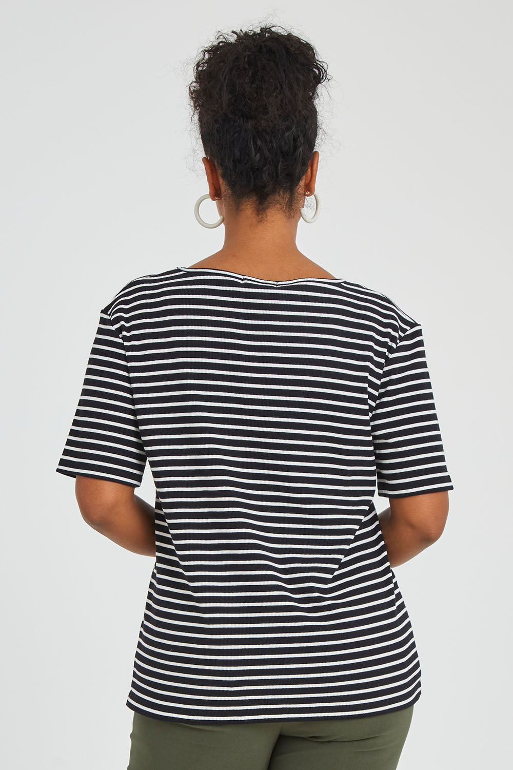 Model Noli wearing size 14 of The Keepers V Neck Striped Rib Tee in colour Black (Black), from the back