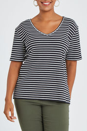 Model Noli wearing size 14 of The Keepers V Neck Striped Rib Tee in colour Black (Black), from the front, cropped image