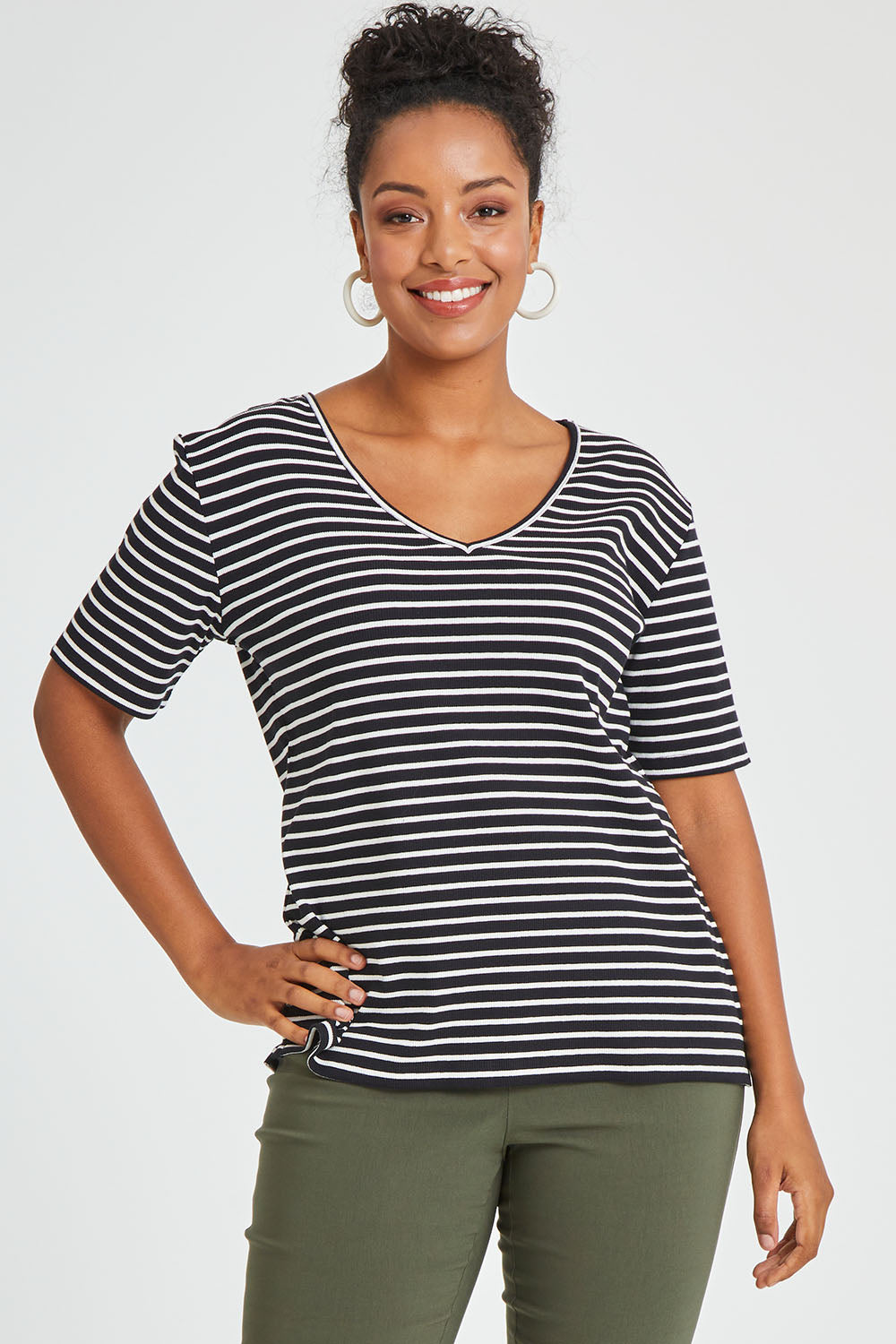 Model Noli wearing size 14 of The Keepers V Neck Striped Rib Tee in colour Black (Black), from the front, cropped image