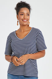 Model Noli wearing size 14 of The Keepers V Neck Striped Rib Tee in colour Navy (Blue), from the front, cropped image