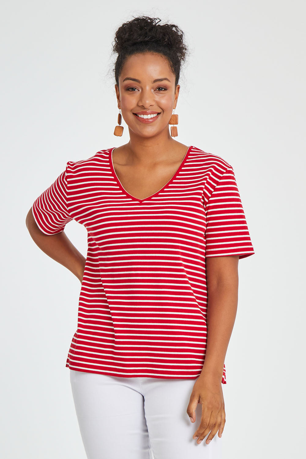 Model Noli wearing size 14 of The Keepers V Neck Striped Rib Tee in colour Red (Red), from the front, cropped image
