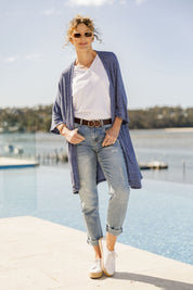 Model Emma wearing size 10 of The Perfect Summer Knit Cardi in colour Denimmarle (Blue), from the front, showing the whole outfit