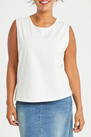 Model Noli wearing size 14 of The Keepers Classic Tank in colour White (White), from the front, cropped image