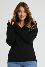 Model Laura wearing size L of The Keepers Soft V Neck Jumper in colour Black (Black), from the front, cropped image