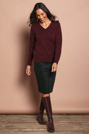 Model Amanda wearing size S of The Keepers Soft V Neck Jumper in colour Burgundy (Purple), from the front, showing the whole outfit
