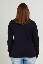 Model Monique wearing size L of The Keepers Soft V Neck Jumper in colour Darknavy (Blue), from the back