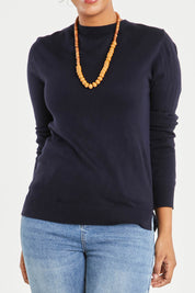 Model Noli wearing size L of The Keepers Soft Round Neck Jumper in colour Darknavy (Blue), from the front, cropped image