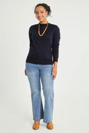Model Noli wearing size L of The Keepers Soft Round Neck Jumper in colour Darknavy (Blue), from the front, showing the whole outfit