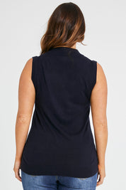 Model Laura wearing size L of The Soft Sleeveless Mockturtle Jumper in colour Darknavy (Blue), from the back
