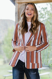 Model Tahlia wearing size 10 of The Classic Stripe Blazer in colour Navyrust (Blue), from the front, showing the whole outfit