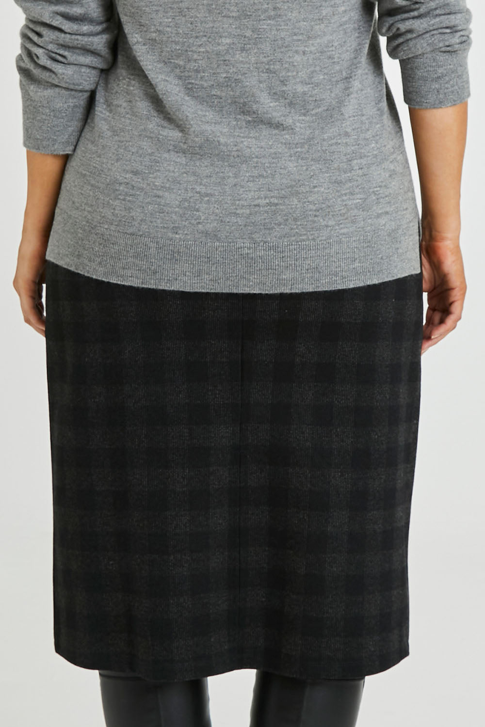 Model Laura wearing size 14 of The Ponte Check Skirt in colour Blackgrey (Black), from the back