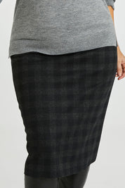 Model Laura wearing size 14 of The Ponte Check Skirt in colour Blackgrey (Black), from the front, cropped image