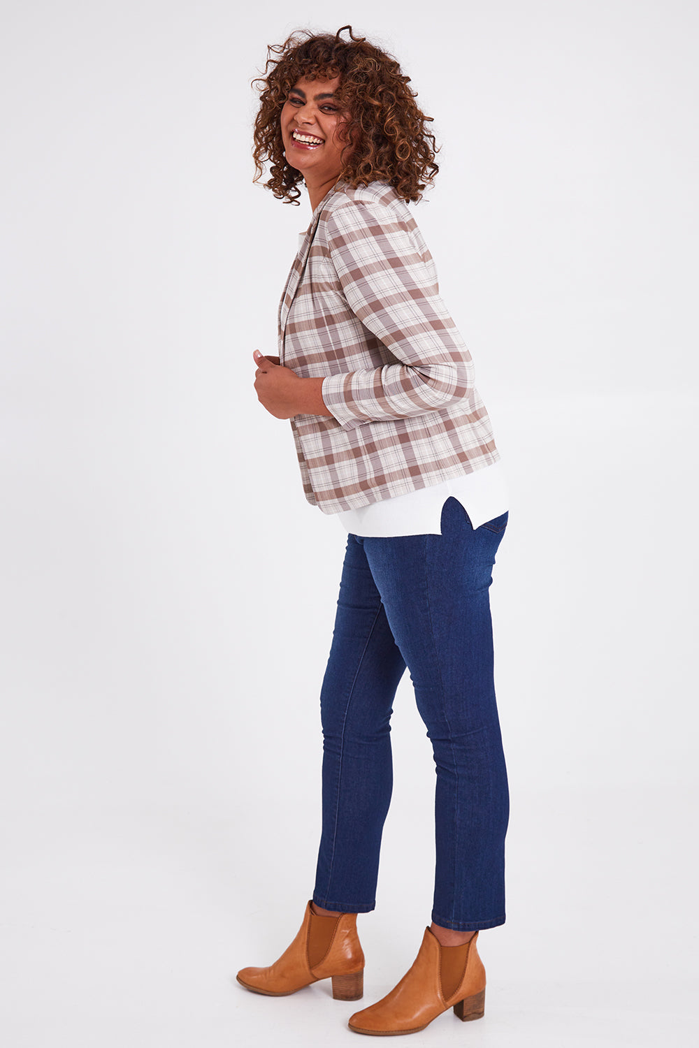Model Anucia wearing size 14 of The Classic Check Blazer in colour Fawncheck, from the front, showing the whole outfit
