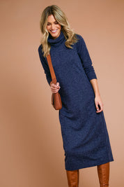 Model Alice wearing size 10 of The High Neck Maxi Dress in colour Navymarle (Blue), from the front, showing the whole outfit