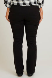 Model Laura wearing size 14 of The Stretch Coloured Denim Jean in colour Black (Black), from the back