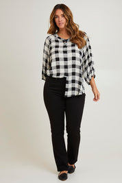 Model Laura wearing size 14 of The Stretch Coloured Denim Jean in colour Black (Black), from the front, showing the whole outfit