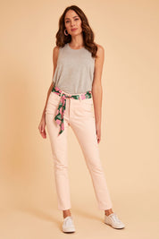 Model Madeline wearing size 10 of The Stretch Coloured Denim Jean in colour Fairyfloss (Pink), from the front, showing the whole outfit