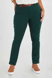 Model Monique wearing size 14 of The Stretch Coloured Denim Jean in colour Peacock (Blue), from the front, cropped image