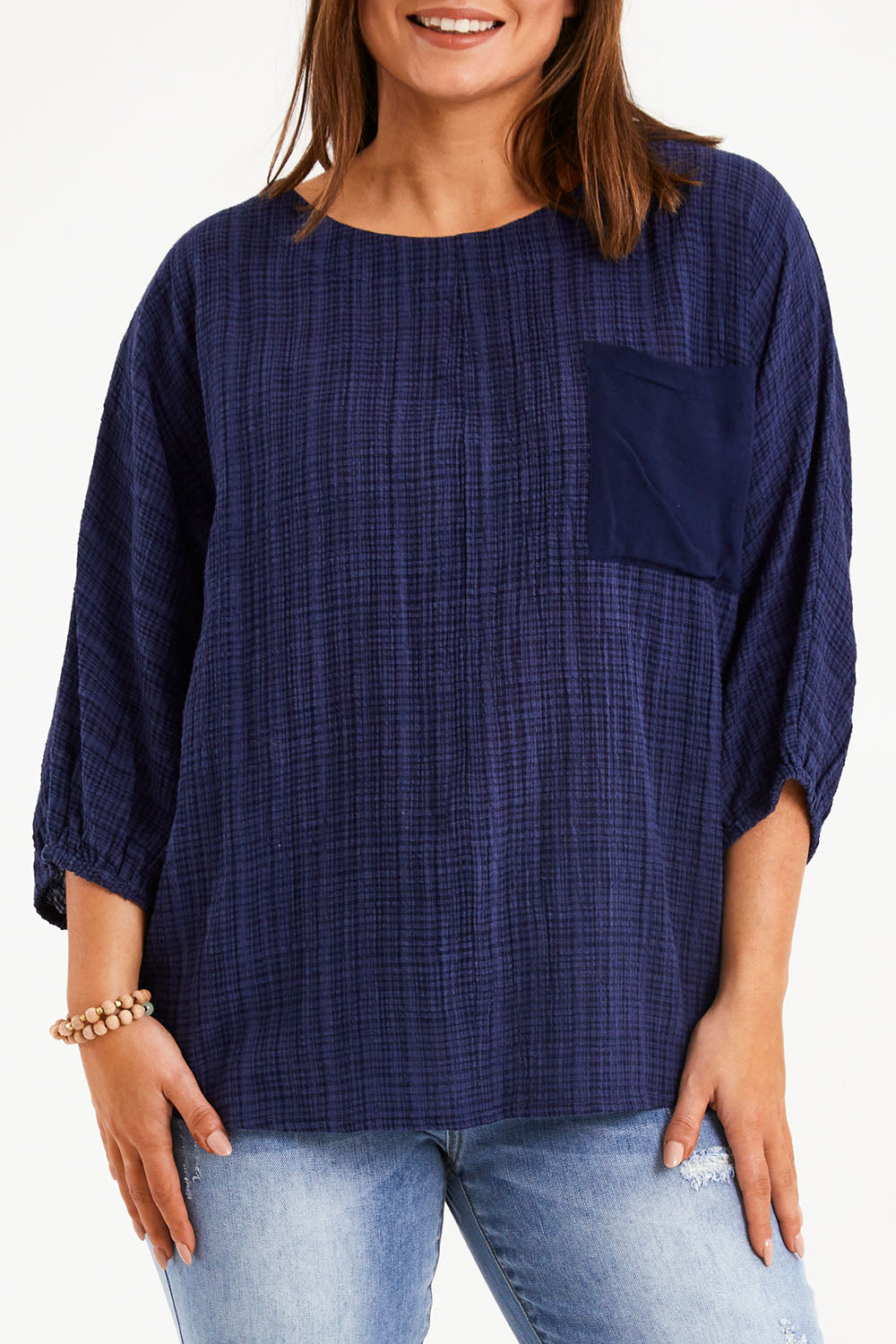 Model Monique wearing size 14 of The Check Pocket Detail Top in colour Navy (Blue), from the front, cropped image