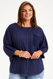 Model Monique wearing size 14 of The Check Pocket Detail Top in colour Navy (Blue), from the front, cropped image