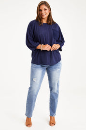 Model Monique wearing size 14 of The Check Pocket Detail Top in colour Navy (Blue), from the front, showing the whole outfit