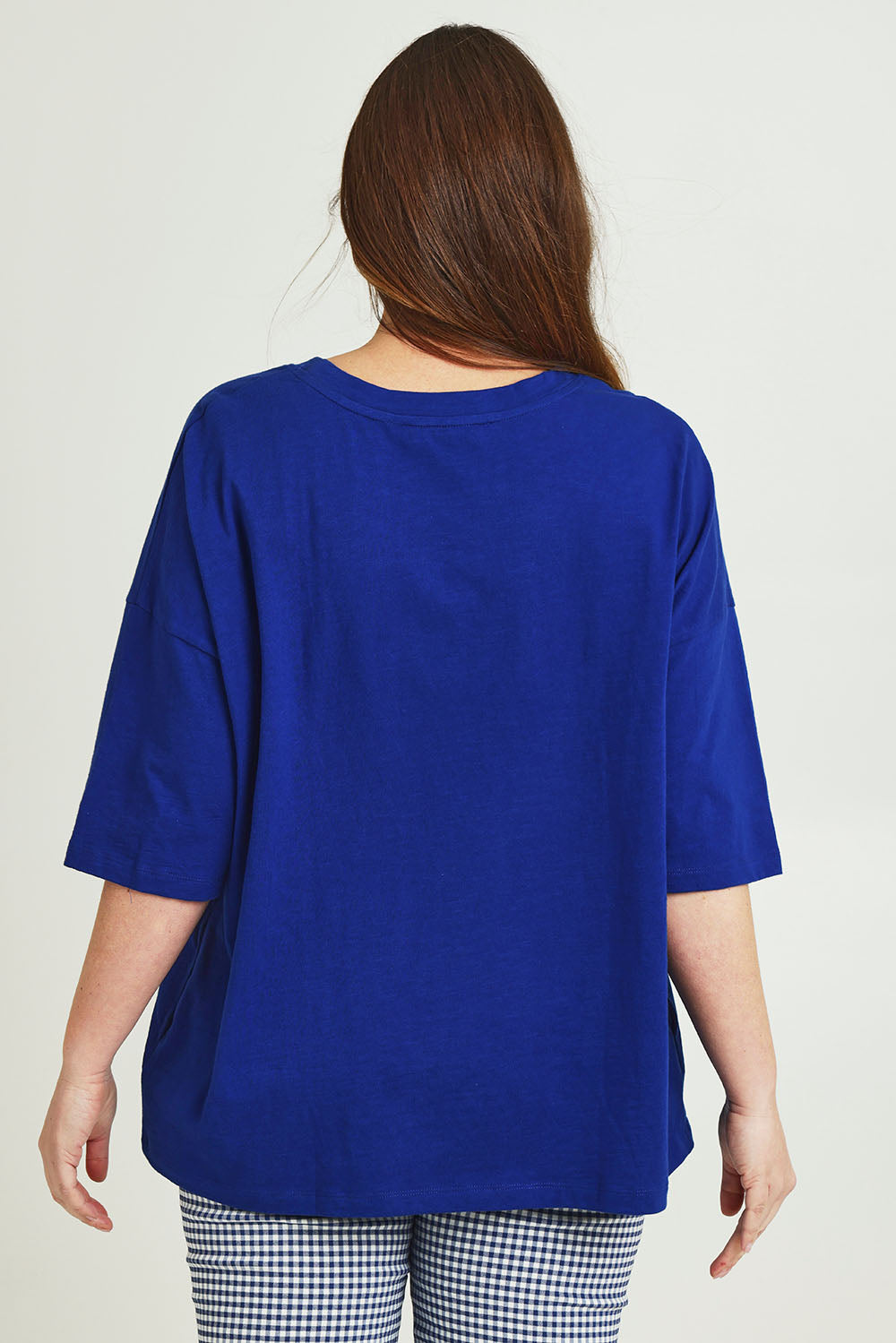 Model Jane wearing size 14 of The Keepers Elbow Length Tee in colour Frenchblue (Blue), from the back