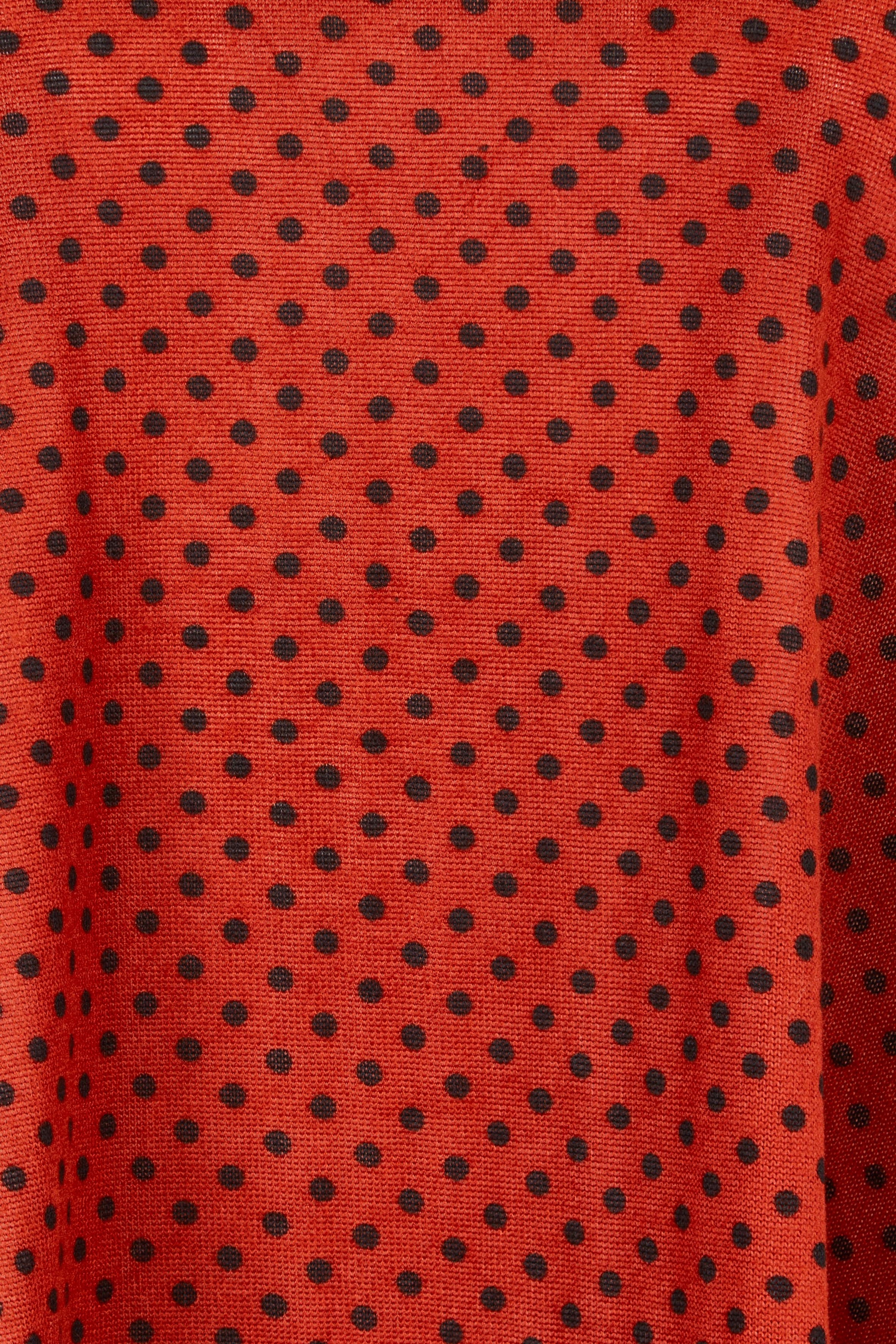 Product shot of The Spot Swing Knit Tee in colour Burntred (Red), detail