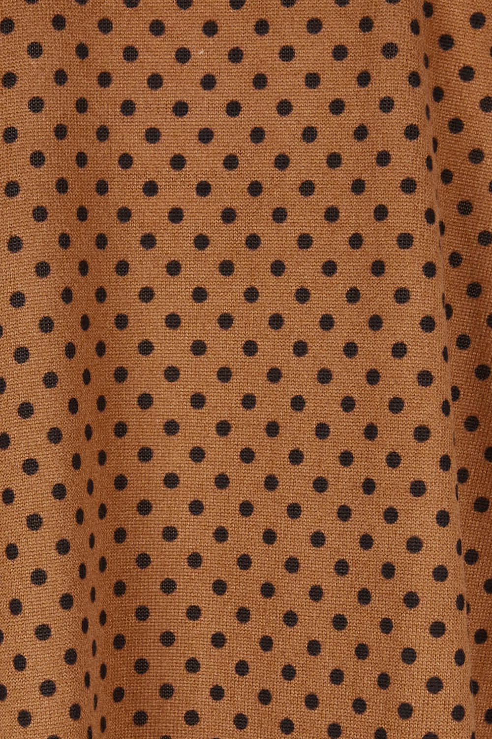 Product shot of The Spot Swing Knit Tee in colour Caramel, detail